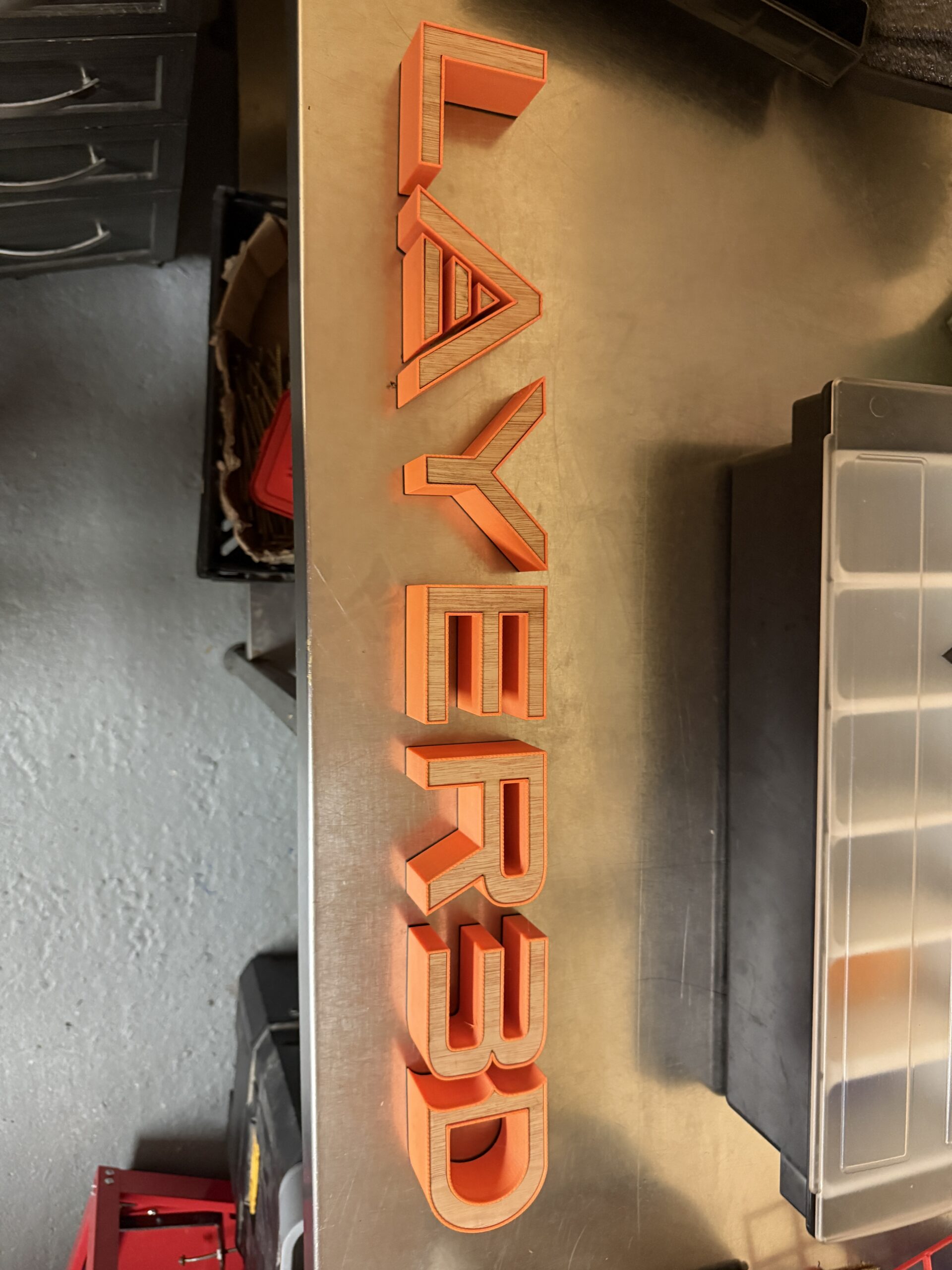 An early illuminated Layer3D sign made in the workshop